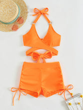 Load image into Gallery viewer, Crisscross Tied Top and Drawstring Shorts Swim Set