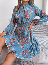 Load image into Gallery viewer, Pleated Printed Tie Neck Long Sleeve Dress