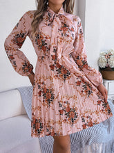 Load image into Gallery viewer, Pleated Printed Tie Neck Long Sleeve Dress