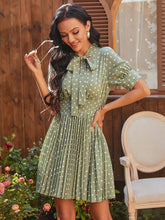 Load image into Gallery viewer, Polka Dot Pleated Tie Neck Smocked Waist Dress