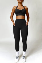 Load image into Gallery viewer, Ruched Halter Neck Bra and Pocketed Leggings Active Set