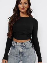 Load image into Gallery viewer, Drawstring Round Neck Long Sleeve Cropped Top